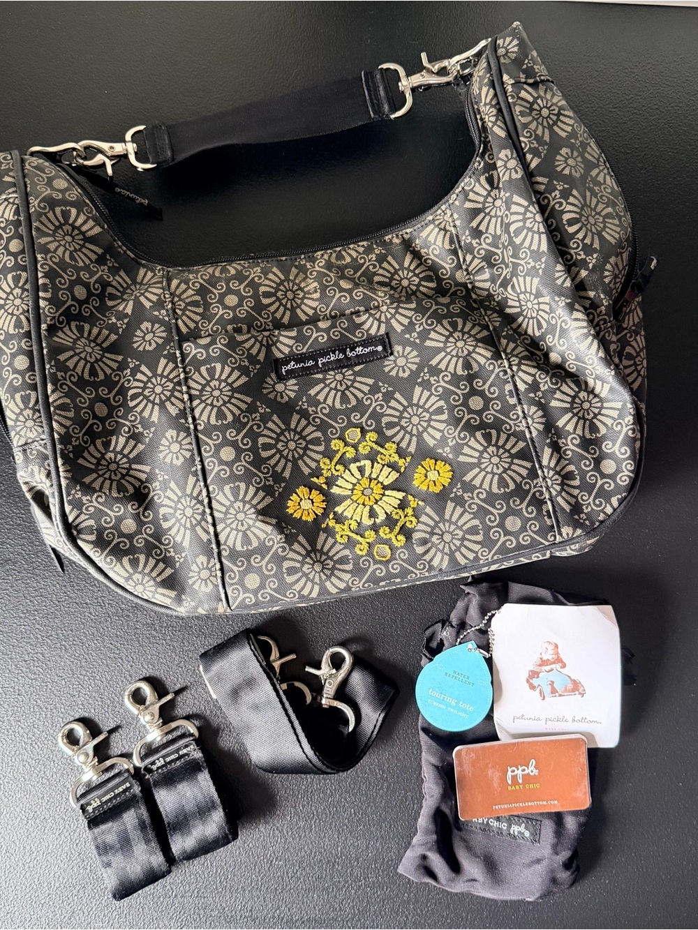 Petunia Pickle Bottom Touring tote diaper bag with yellow embroidery